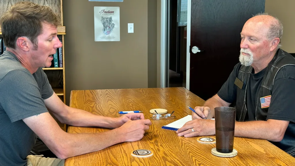 Personal Injury Attorney Dan Matzdorff consults with a client about an accident