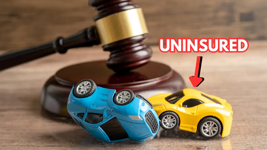 Image of two toy cars in front of a gavel with the word Uninsured written in red and white text and an arrow pointing to one of the cars.