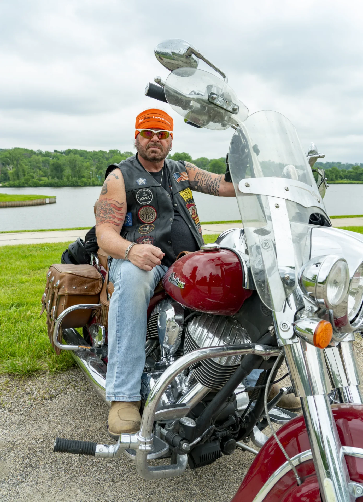 Pete Leehey, Founder of The Biker Lawyers PC, sits on his Indian Chief motorcycle