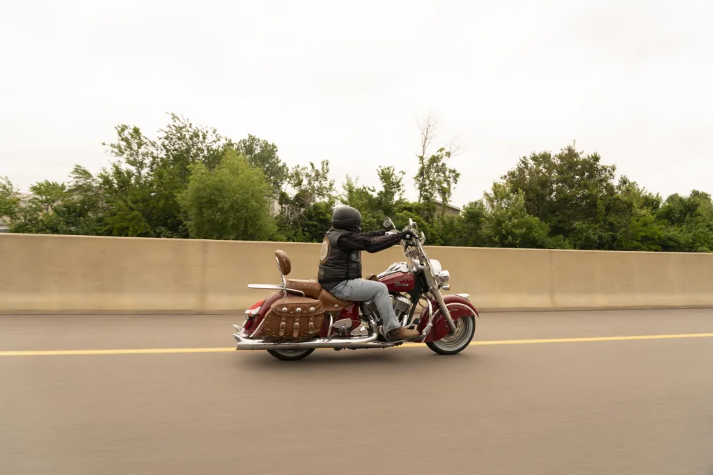 Pete Leehey, personal injury attorney and founder of The Biker Lawyers PC in Cedar Rapids Iowa rides his motorcycle on the highway