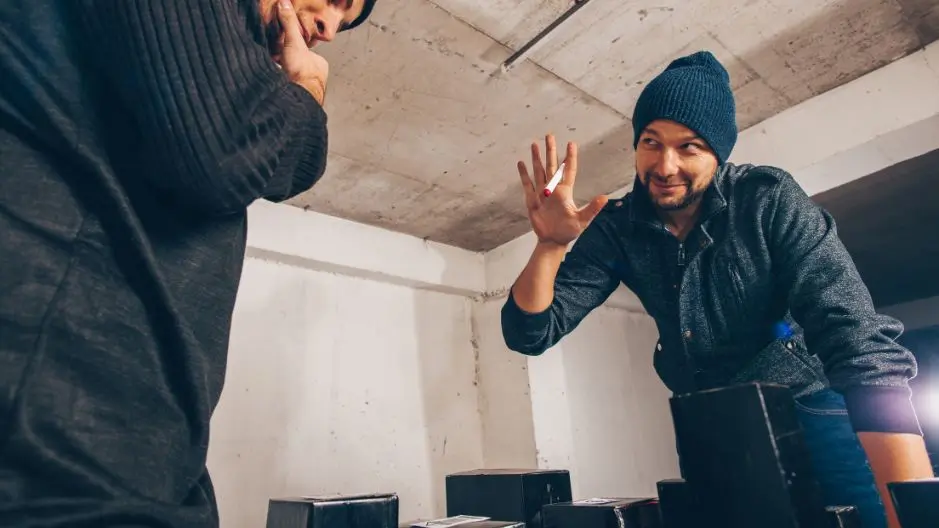 Image of two criminals planning a crime.