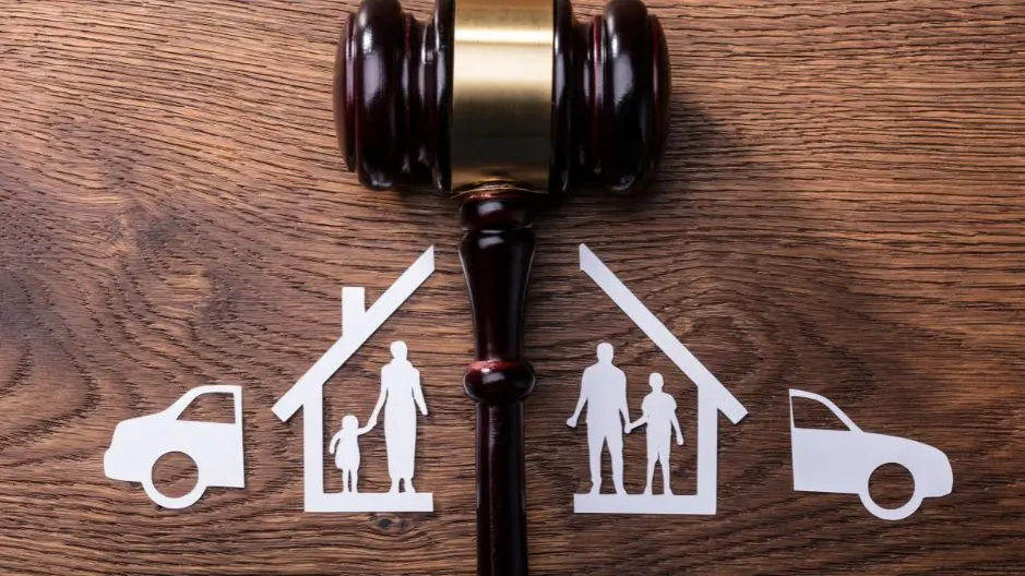 Image of a judge's gavel with an illustration of a family divided to illustrate the power of family law