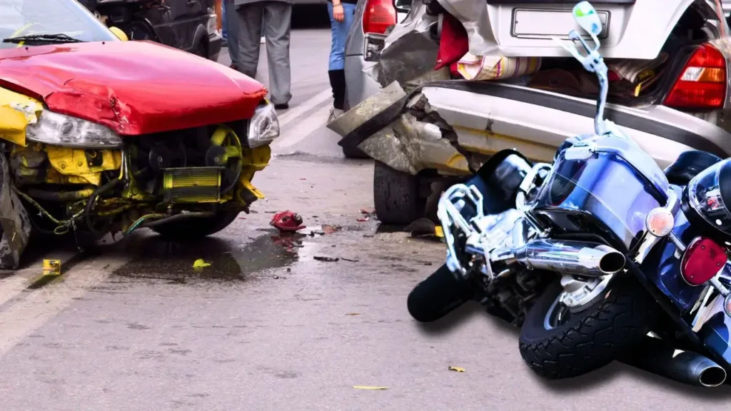 The scene of a motorcycle and multi-car accident.
