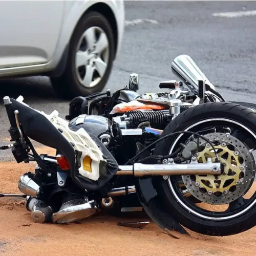 Close-up photo of a motorcycle at the scene of a crash